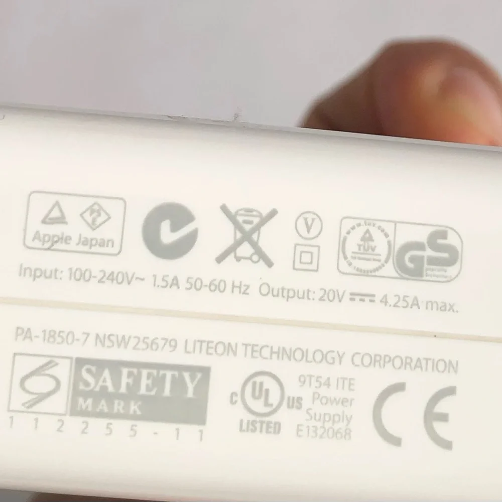 Apple White MagSafe Power Adapter with Attached Cable 7cmX7cm.